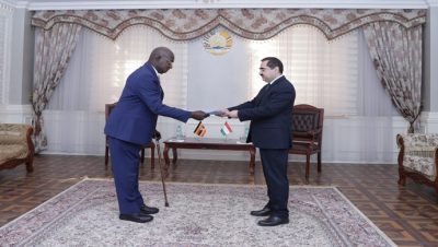 Presenting copy of Credentials by the Ambassador of the Republic of Uganda